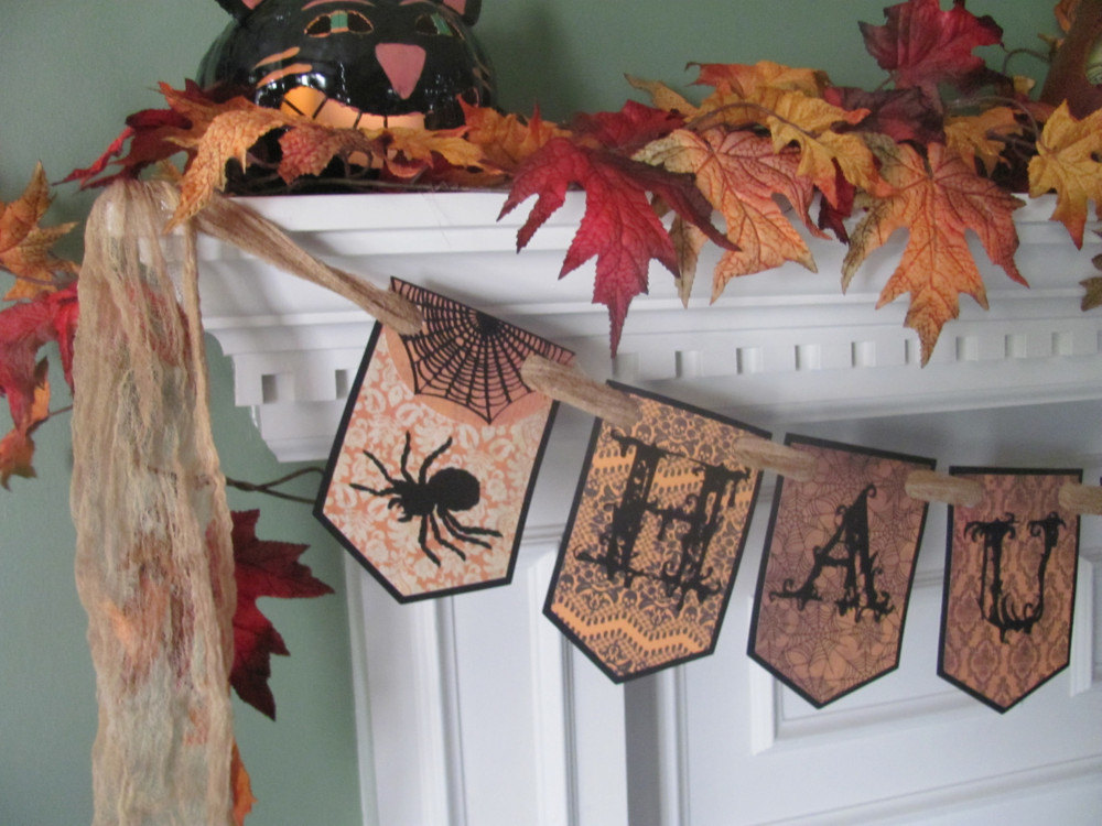 Victorian Inspired Haunted" Halloween Banner Featuring Gothic Style Lettering With Spiders & Bats